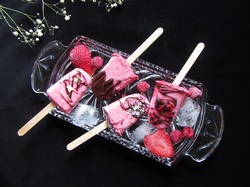 Strawberry ice cream bars on a stick