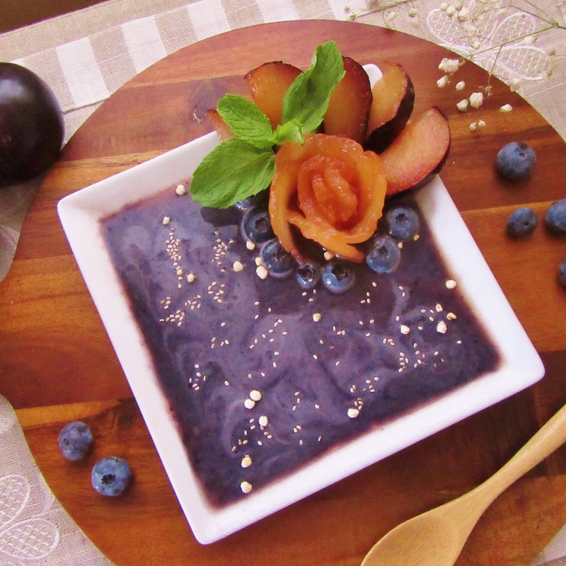 Blueberry Bliss Smoothie Bowl garnished with fresh blueberries and a sliced plum.